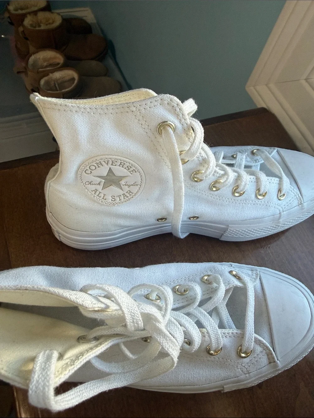 Converse White High-Top Canvas Sneakers with Gold Eyelets